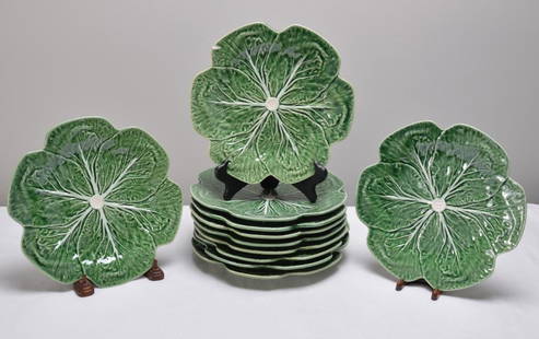 Eleven (11) Bordallo Pinheiro Majolica Cabbage Leaf Green Dinner Plates: 11 cabbage leaf dinner plates, each marked on baseDimensions: H 1 x W 10.5 x D 10.5 inchesNOTE: One plate with a chip on the edge.