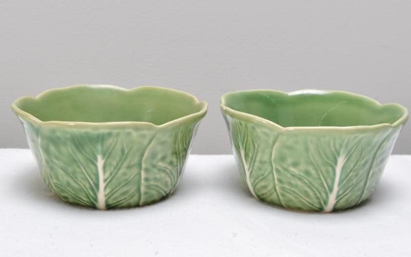 Two (2) Bordallo Pinheiro Majolica Cabbage Green Relish Bowls: Each marked on base. Dimensions: H 2.5 x W 5 x D 5 inches NOTE: One small chip to rim