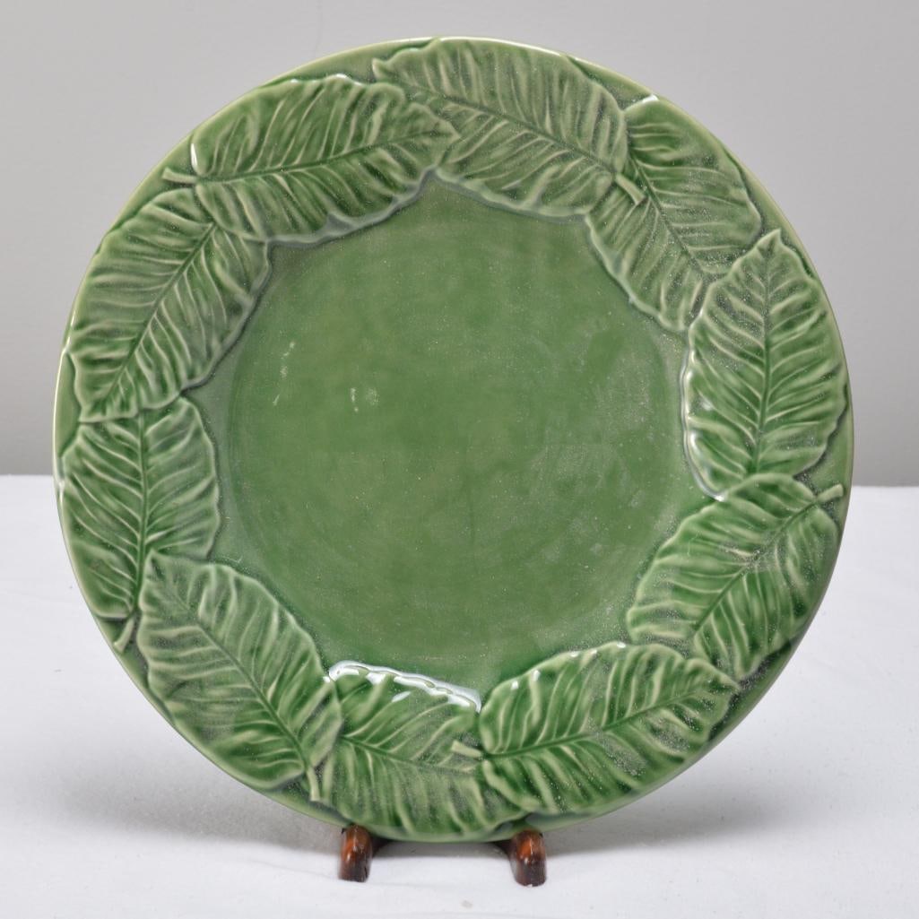 A Bordallo Pinheiro Majolica Leaf Service Green Plate: Marked on base. Dimensions: H 1 x W 10.5 x D 10.5 inches NOTE: No apparent chips or evidence of repairs.