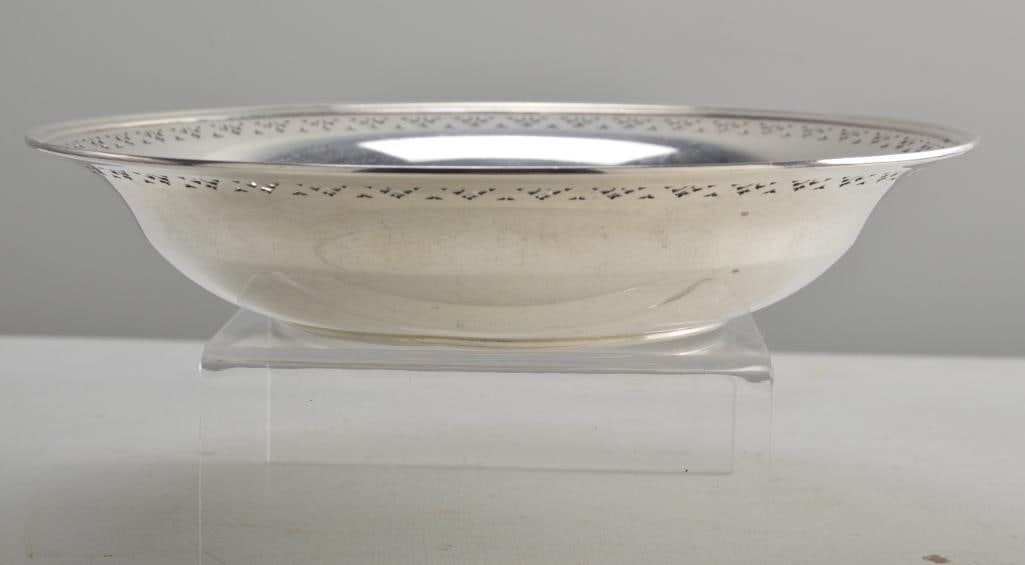 Tiffany & Co. Sterling Silver Bowl: With a pierced rim, Marked on base. Approximate Total Weight: 409g Dimensions: H 1.75 x W 9 x D 9 inches NOTE: Wear consistent with age and use