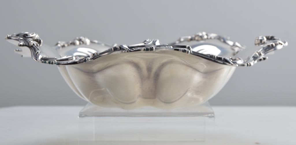 Reed & Barton Sterling Silver Center Bowl: With a lobed rim of acanthus leaves over a lobed interior. Marked on base, Total Weight: 574g Dimensions: H 2.5 x W 11 x D 11 inches NOTE: Wear consistent with age and use