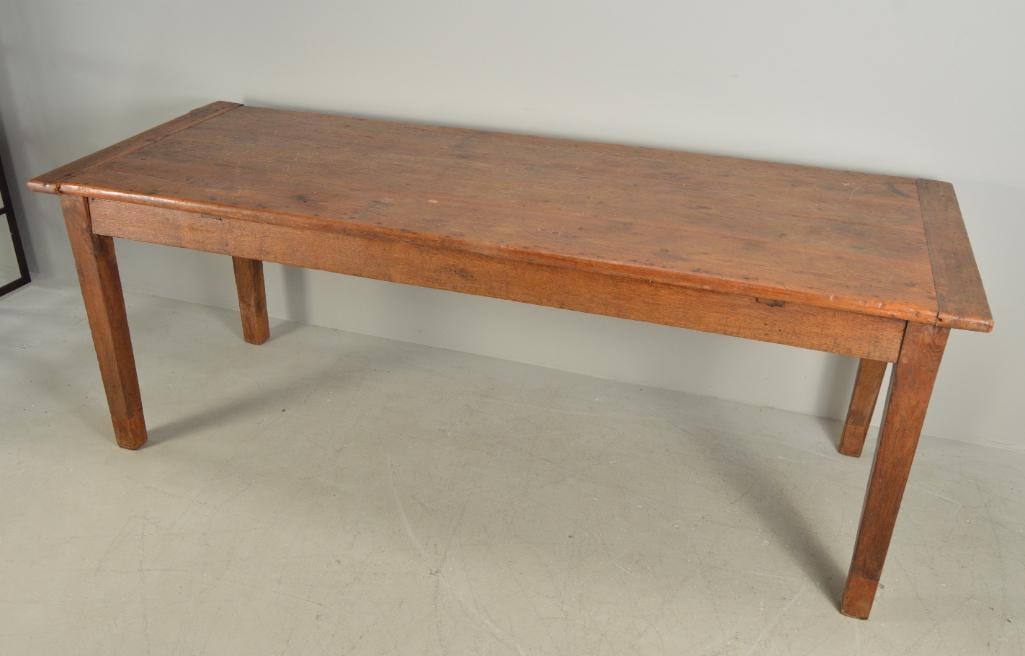 Pine Farm Table: 19th Century, with a moulded rectangular top over a plain frieze, raised on tapering square legs. Drawer missing on side.Dimensions: H 30 x W 90 x D 30 inchesNOTE: Feet have been replaced, otherwise w