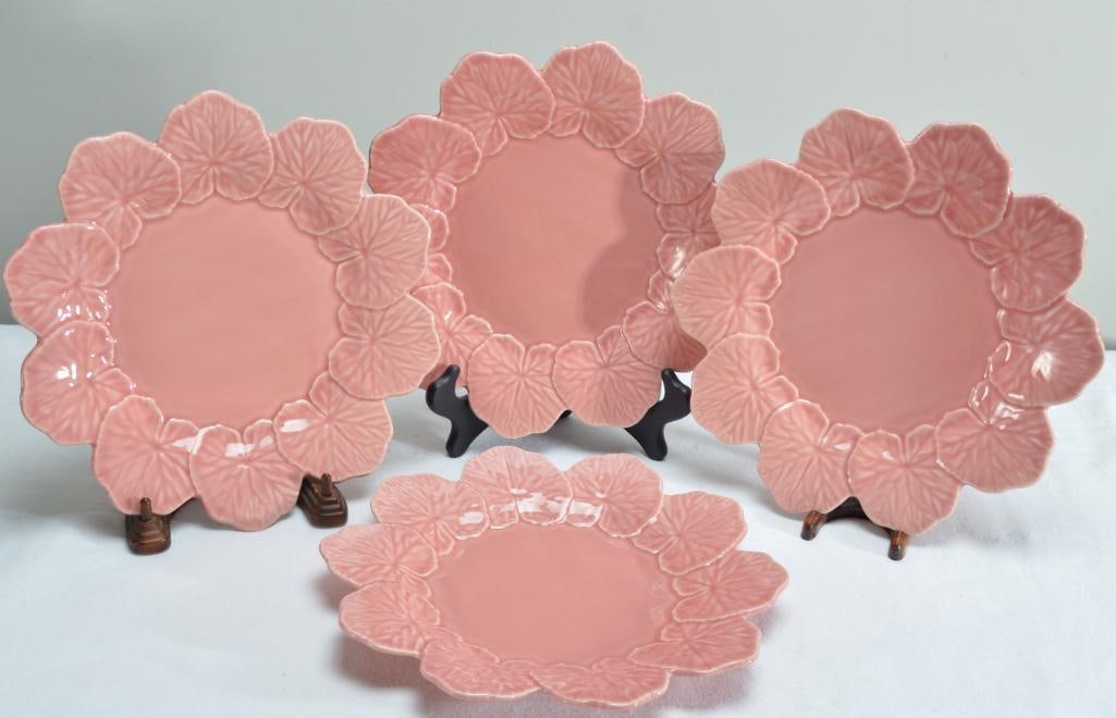Four (4) Bordallo Pinheiro Majolica Geranium Pink Dinner Plates: Each marked on base.Dimensions: H 1 x W 11 x D 11 inchesNOTE: No apparent chips or evidence of repairs.
