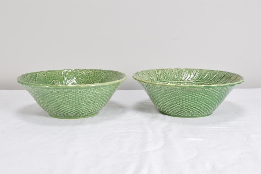Two (2) Portuguese Majolica Salad Bowls: One marked Bordallo Pinheiro Majolica on base in Basketweave Green pattern. The other unmarked. Dimensions: H 4.25 x W 12 x D 12 inches NOTE: No evidence of cracks, chips or repairs.