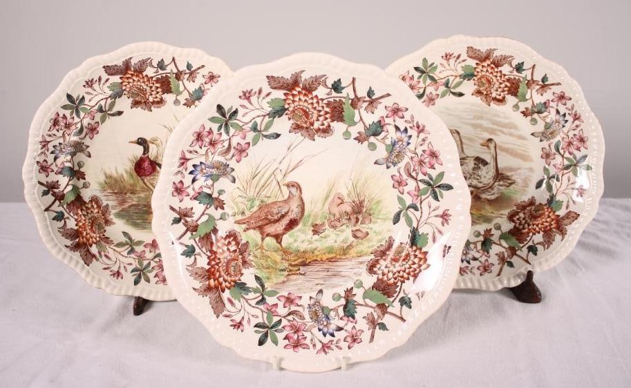 Three Copeland Plates: Each 10.75 inches diameter, Wild Geese, Wild Ducks and Partridge Dimensions: 1 x 10.75 x 10.75 in. NOTE: Wild Duck has a hairline crack on the body