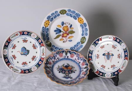 Four (4) Dutch Plates: Two marked Makkum, two marked Delft, with traditional floral and insect patterns. Measurements for the largest. Dimensions: H 1 x W 8.75 x D 8.75 inches NOTE: No apparent chips or cracks