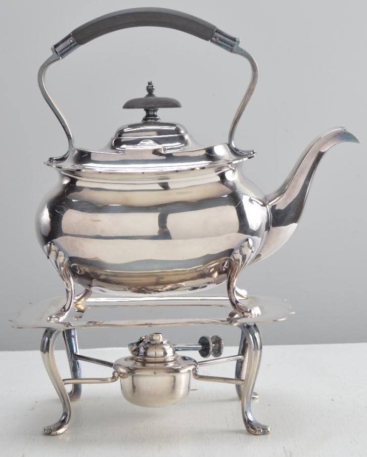 Walker and Hall Sheffield Plate Teapot on Stand: Teapot over an open stand with heating element. Dimensions: H 13 x W 11 x D 6 inches NOTE: Wear consistent with age and use