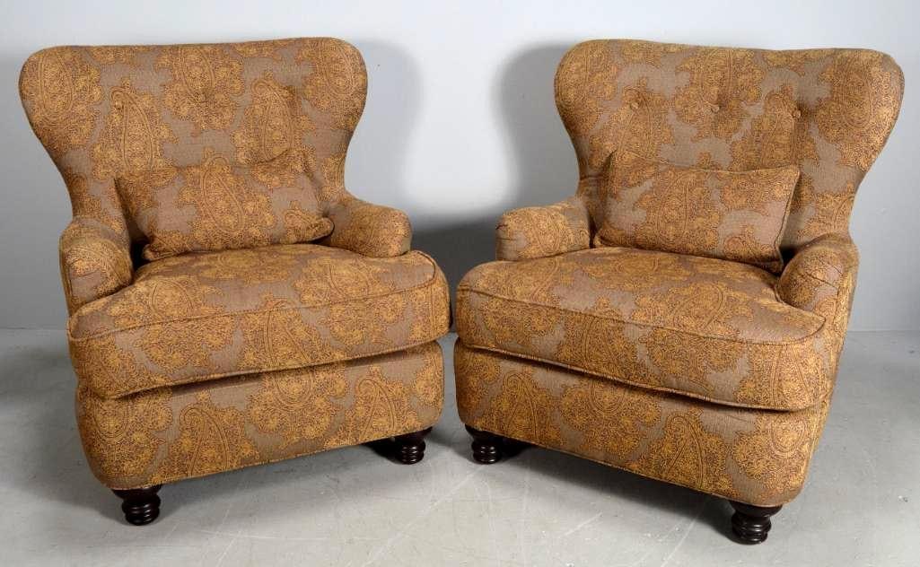 Pair of Upholstered Arm Chairs: With a shaped back and seat, fully upholstered and raised on four bulb form legs. By Arhaus Furniture. Dimensions: H 36 x W 30 x D 36 inches NOTE: Wear consistent with age and use Property from an A
