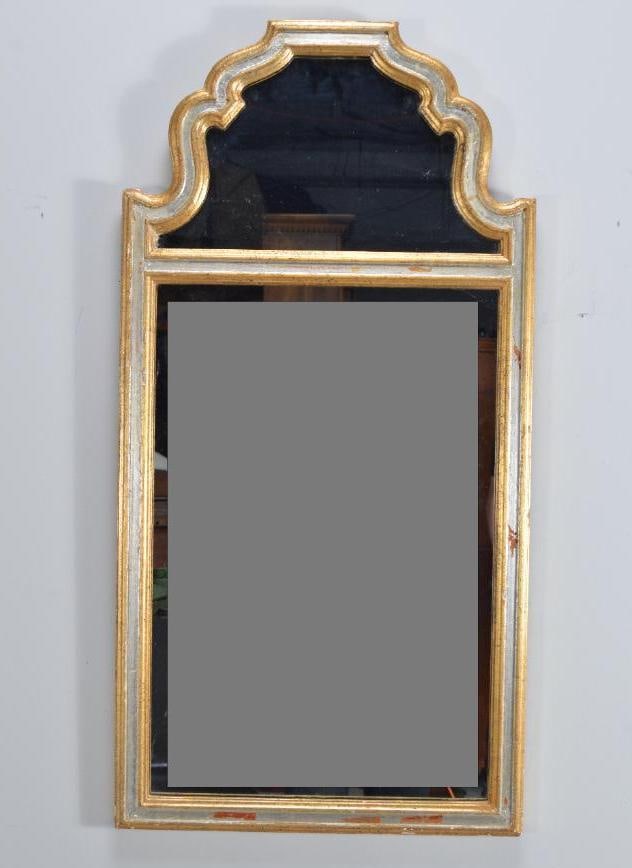 Queen Anne Style Giltwood Mirror: With a shaped top rail over a trumeau glass, the main, beveled glass flanked by giltwood rails. Dimensions: H 38 x W 19 x D 1 inches NOTE: Wear consistent with age and use