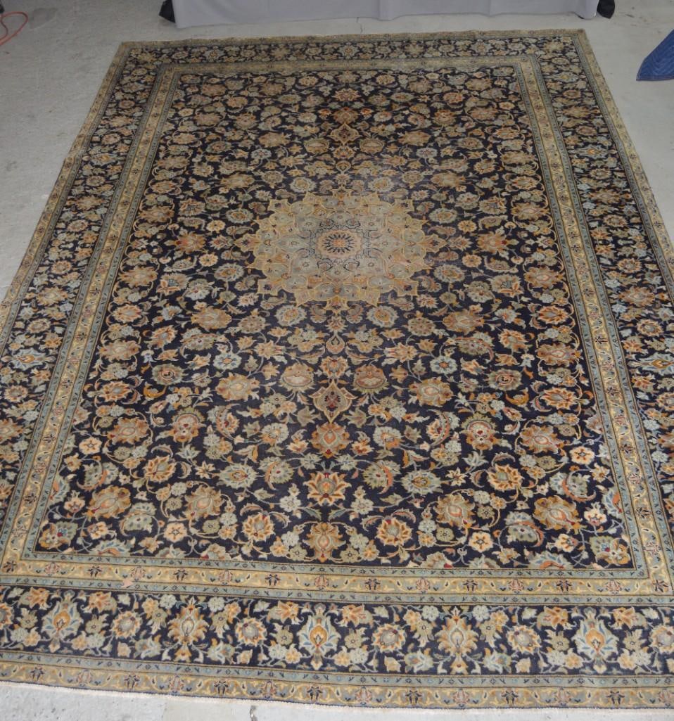 9' 5" x 12' 9" Persian Blue Nain Rug: Hand tied Persian rug, Nain, center medallion on blue ground, cream border, label on bottom. Dimensions: W x L 113 x 153 Color: Blue Weave: Material: wool Provence: Country: Iran Condi