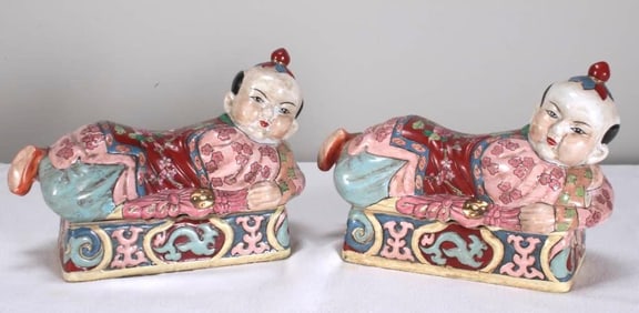 Pair of Famille Rose Figural Porcelain Pillow Boxes, marked Jiaqing