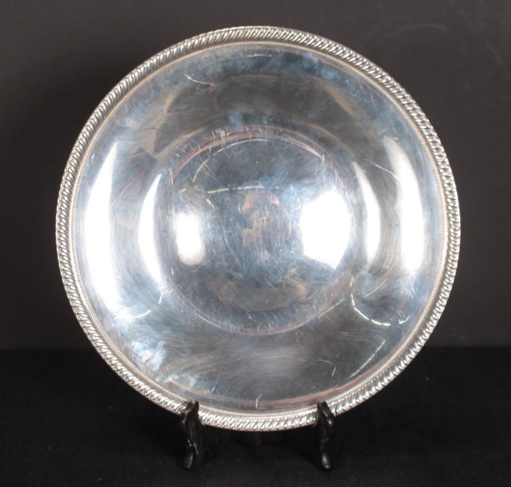 Fisher Sterling Silver Platter: "Kent" pattern. Makers mark, Sterling, 1541 and pattern to underside of base. Approx. 475 gr. Dimensions: H 1 x W 11.125 x D 11.125 inches NOTE: Dented to base
