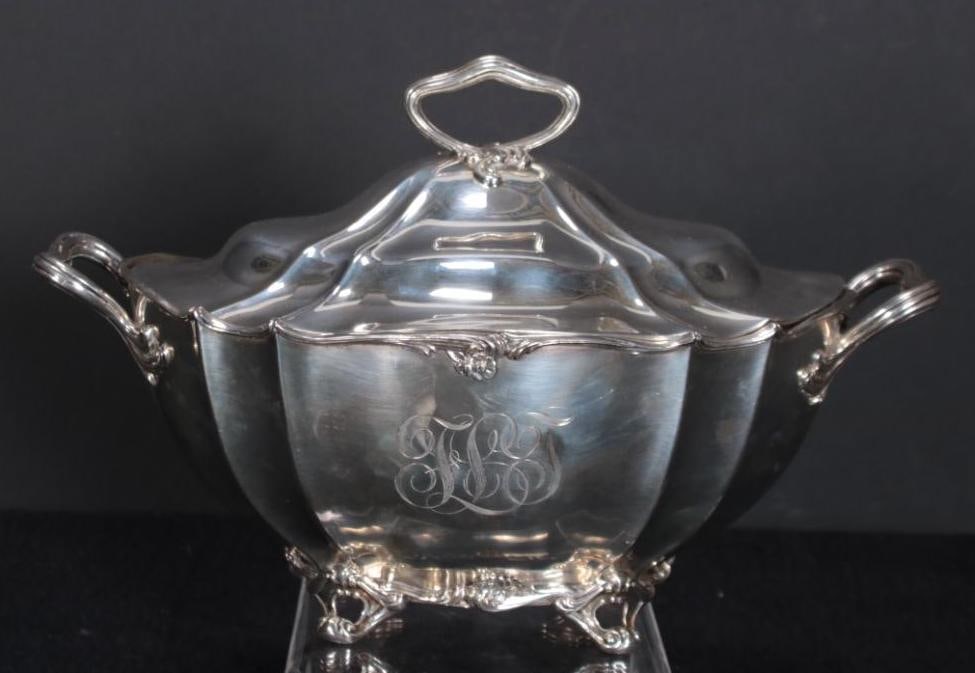 Gorham Sterling Tureen: Oval shape with panel sides and conforming cover, on scroll feet. Date mark, Sterling, A840 and "3 Pint" Approx. 1150 gr. Dimensions: H 7.5 x W 12 x D 7.5 inches NOTE: Monogrammed and wear c