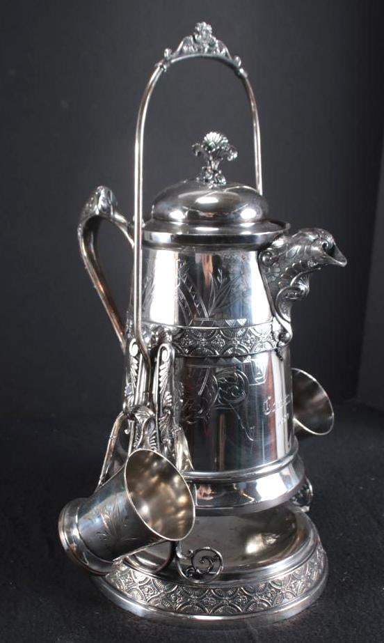 E.G. Webster & Bro. Pitcher on Stand: Monogrammed "S", with goblets. Inscribed "Christmas 1880" Dimensions: H 20 x W 14 x D 11 inches NOTE: Wear consistent with age and use