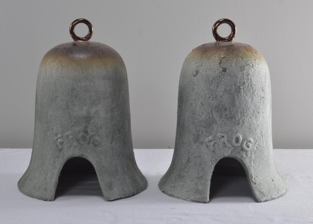 Pair of Pottery Frog Prince Houses: Of bell form, with a distressed glaze Dimensions: H 13 x W 9 x D 9 inches NOTE: Good condition Property from an Anchorage, KY home