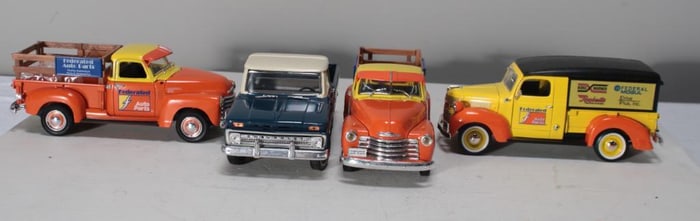 Four Diecast Delivery Trucks