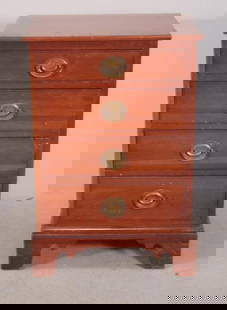 George III Style Small Chest of Drawers: With a rectangular top over four drawers, raised on bracket feet. Manufactured by Willett Dimensions: H 28 x W 19 x D 15 inches NOTE: Burn to top