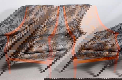 Pair of Louis XVI Style Mahogany Library Chairs: Each with upholstered back and seat flanked by carved and shaped arms and stumps, raised on four reeded legs. Dimensions: H 40 x W 28 x D 31 inches NOTE: Wear consistent with age and use