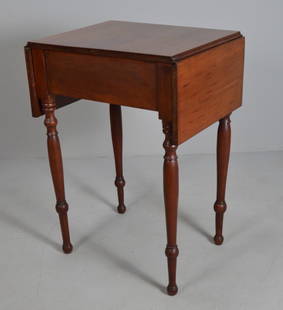 Late Federal Cherry Work Table: With a square top with rising wings, over a single beaded drawer, the whole raised on four turned legs. Dimensions: H 30 x W 38 x D 16.5 inches NOTE: Wear consistent with age and use
