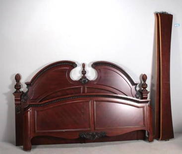King Size Bedstead: Broken pediment headboard with center finial and carving Dimensions: H 51 x W 83 x D 86 inches NOTE: Wear consistent with age and use