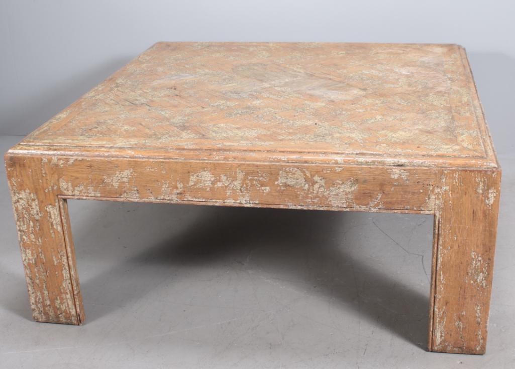 Distressed Finish Coffee Table: With a square, moulded parquet top with distressed finish, raised on four bracket legs Dimensions: H 18.5 x W 42 x D 42 inches NOTE: Wear consistent with age and use
