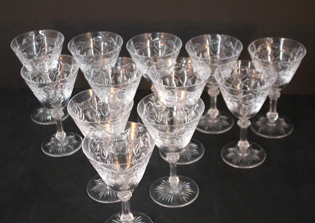 Twelve Baccarat Clarets: Marennes pattern crystal clarets. Dimensions: H 6 x W 3.75 x D 3.75 inches NOTE: Good