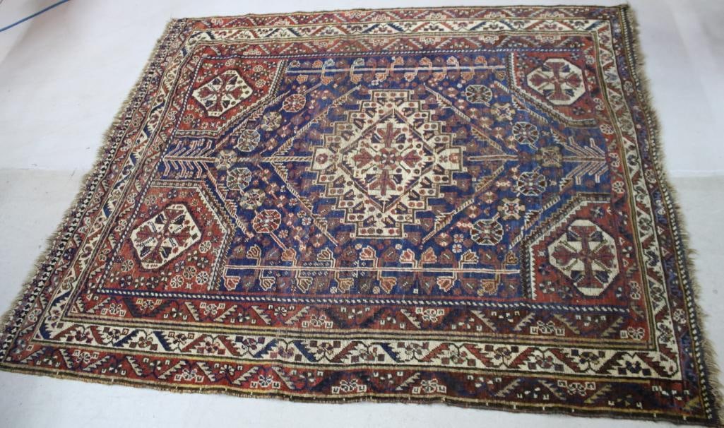 5.75 ft x 5 ft. Persian Qashqai Rug: With vibrant colors and bold, geometric diamonds, medallions, and stars. Dimensions: H 70 x W 60 x D inches NOTE:
