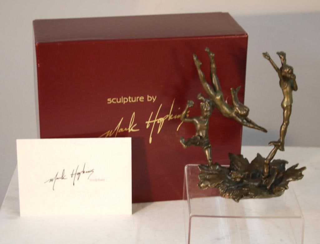 Mark Hopkins (1965, Colorado): "Last One In" Limited Edition Bronze Sculpture, , Late 20th century. Cast bronze sculpture depicting three stylized nude figures in dynamic, airborne poses, raised on an organically modeled in