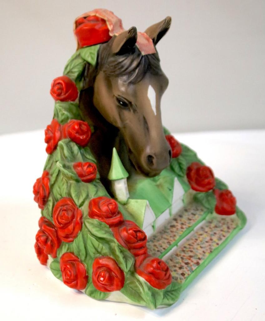 Churchill Downs Aesthetic Classics – Derby Whiskey Decanter: Churchill Downs Aesthetic Classics – Derby Whiskey DecanterCeramic figural decanter in the form of a horse head surrounded by roses with Churchill Downs grandstand motif, containing Kentucky Straigh
