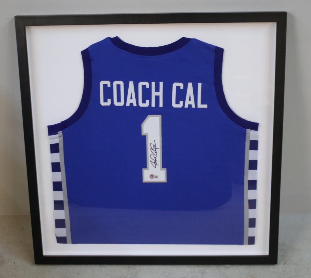 John Calipari “Coach Cal?? Signed UK Jersey (Beckett): Framed University of Kentucky Wildcats blue basketball jersey with “COACH CAL” across the shoulders and number 1, signed in black ink by head coach John Calipari on the numeral, accompanied by