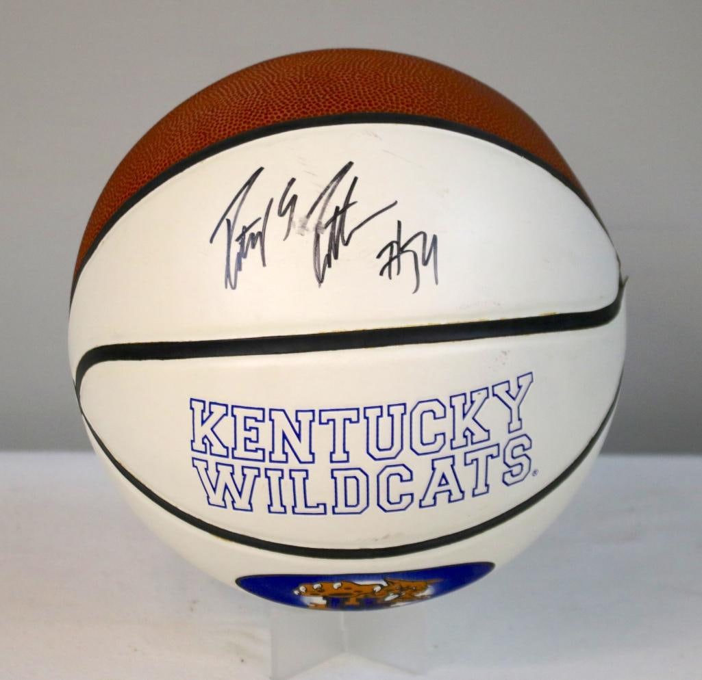 Patrick Patterson Signed UK Basketball: White University of Kentucky logo basketball Patrick Patterson signed in black marker. The signature is bold and well-placed on the white panel. Full-size ball with typical light handling wear. Dime