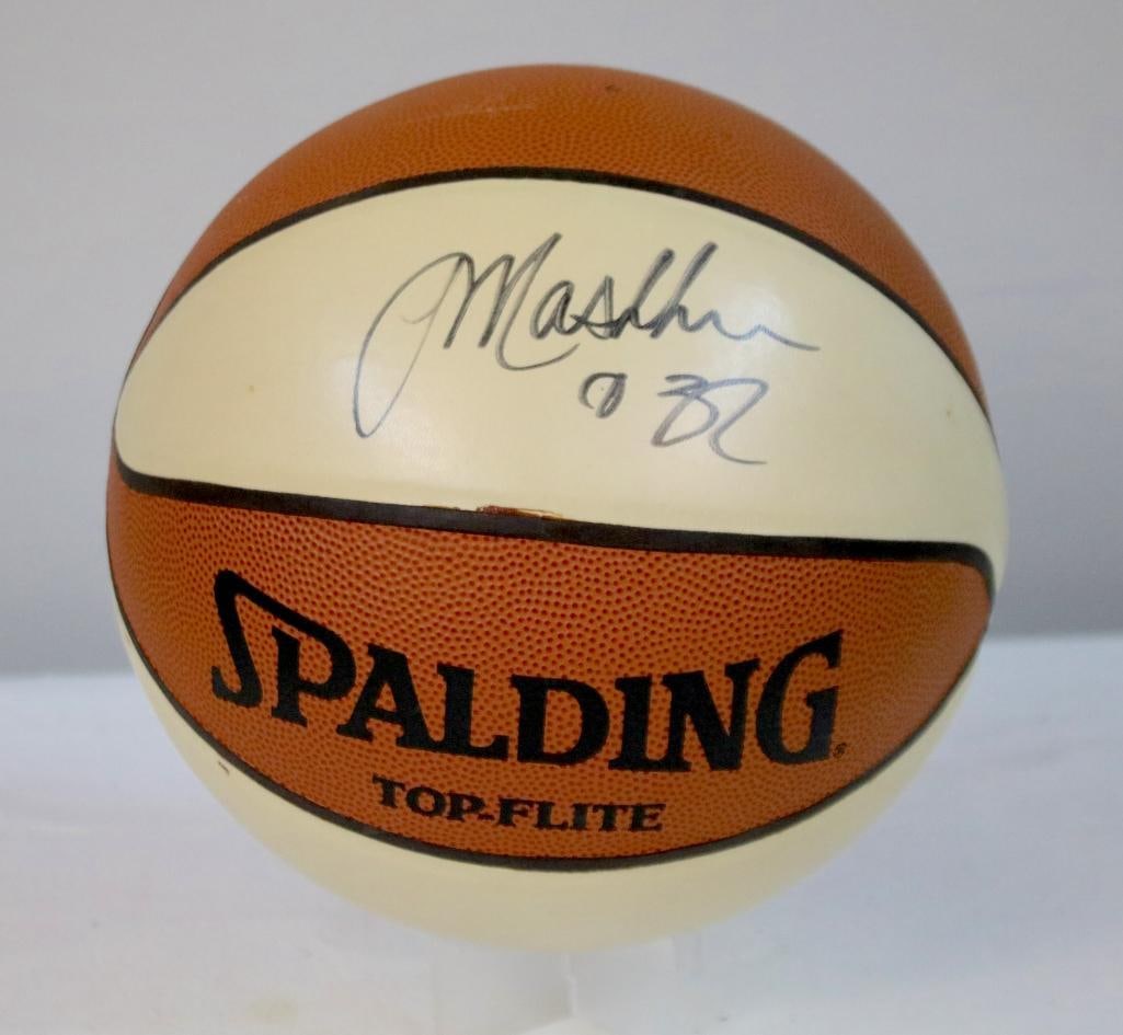 Jamal Mashburn Autographed UK Basketball: Spalding Top-Flite full-size synthetic leather basketball in traditional orange and cream colorway, signed in silver marker “Mashburn 32” across the cream panel. The ball shows light surface w