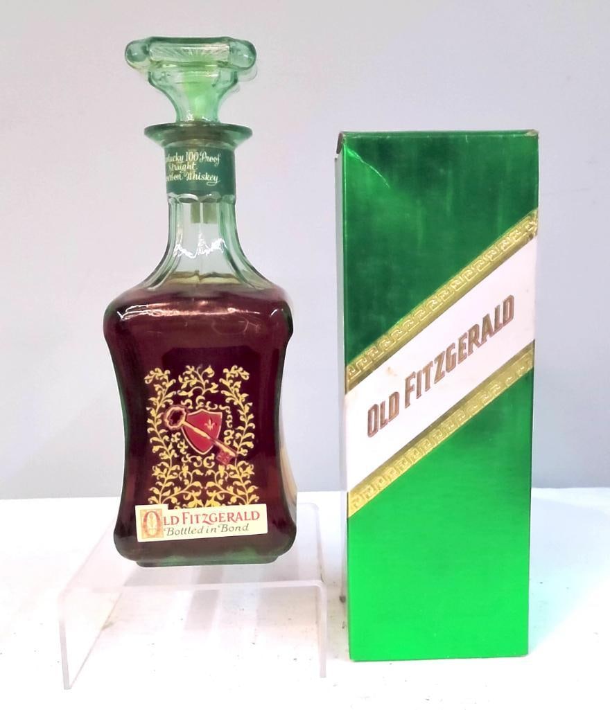 1973 Old Fitzgerald - Hospitality Decanter Bourbon - BIB: 1973 Old Fitzgerald - Hospitality Decanter Bourbon - BIBA 4/5 quart (approx. 750 ml) Old Fitzgerald Bottled in Bond Kentucky Straight Bourbon Whiskey presented in a molded green glass “Hospitality D