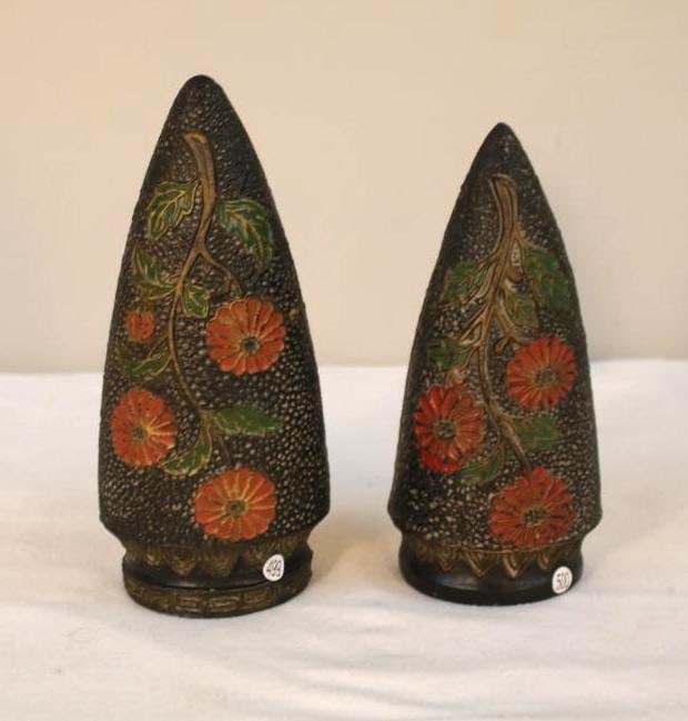 Pair of Hand-Decorated Ceramic Conical Vases: A matching pair of hand-decorated ceramic vases of tapering conical form, each decorated with stylized floral motifs in red, green, and ochre against a textured dark ground. The surfaces show incised 