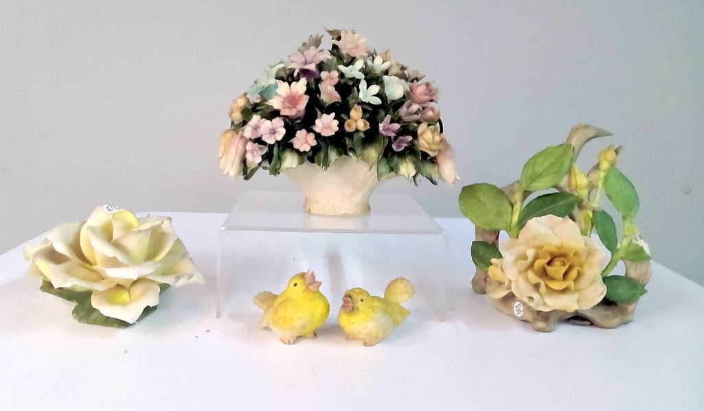 Italian Capodimonte-Style Porcelain Floral Group and Accessories: Group of five decorative porcelain pieces including a large floral basket centerpiece, two single rose studies, a floral arrangement on a naturalistic base, and a pair of small yellow bird figures;