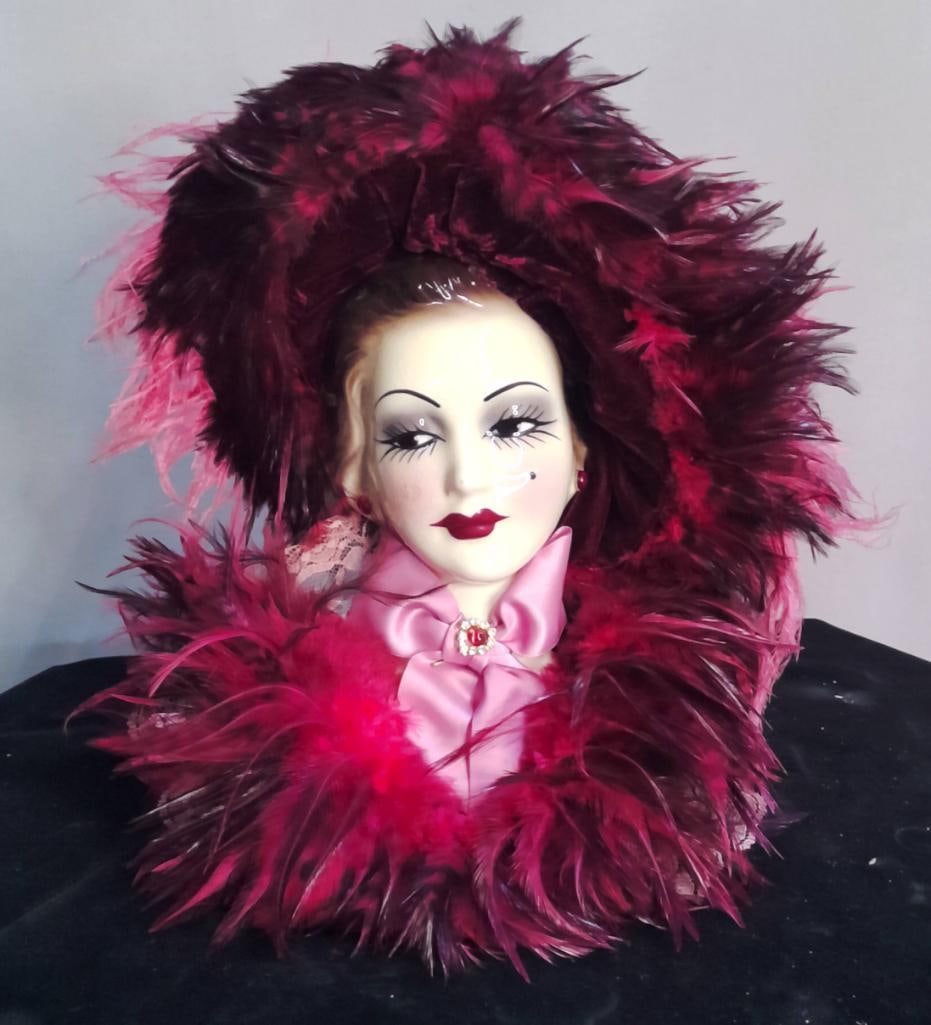 Victortian Style “Lady Face Mask?? Wall Hanging (Burgandy Trim): Limited edition decorative wall mask featuring a porcelain lady’s face with feathered hat, lace trim, and jewel accent, labeled Unique Creations, San Francisco (Ray Mak). Late 20th century. Dimensio