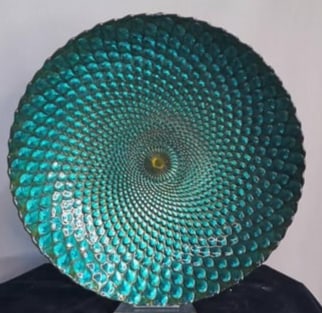 Large Pressed Glass Charger, Teal Hobnail Pattern: Circular glass charger with radiating hobnail or scale motif, finished in iridescent teal with frosted underside. Dimensions: H 2 x W 15 x D inches NOTE: Good overall; no chips or cracks observed