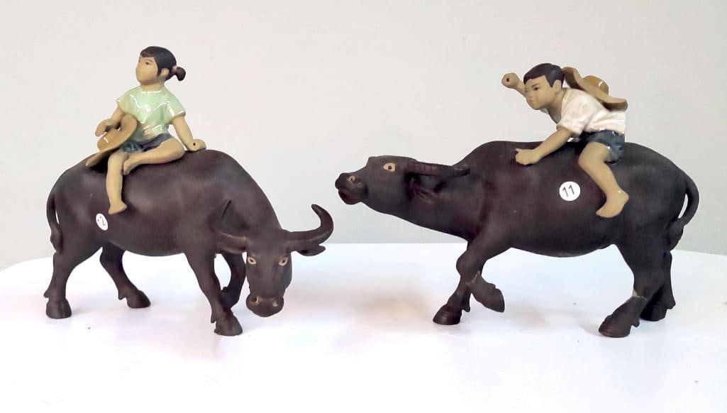 Pair of Asian Porcelain Figures of Children Riding Water Buffalo (1 of 9)