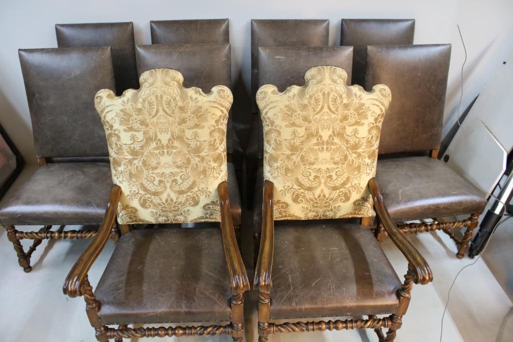Ten Louis XIV–Style Carved Wood Dining Chairs: Comprising eight side chairs upholstered in dark brown leather and a pair of armchairs with patterned fabric upholstered backs and leather seats. All constructed of carved hardwood with turned legs an