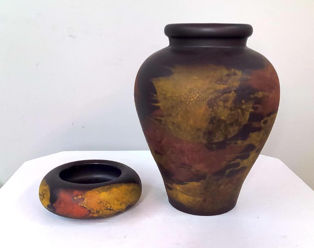 Haeger Pottery Decorative Vase and Bowl: Two-piece glazed pottery decorative set by Haeger Pottery, Dundee, Illinois, comprising a baluster-form vase and matching low bowl. Finished in a mottled palette of bronze, copper, burgundy, and gold 