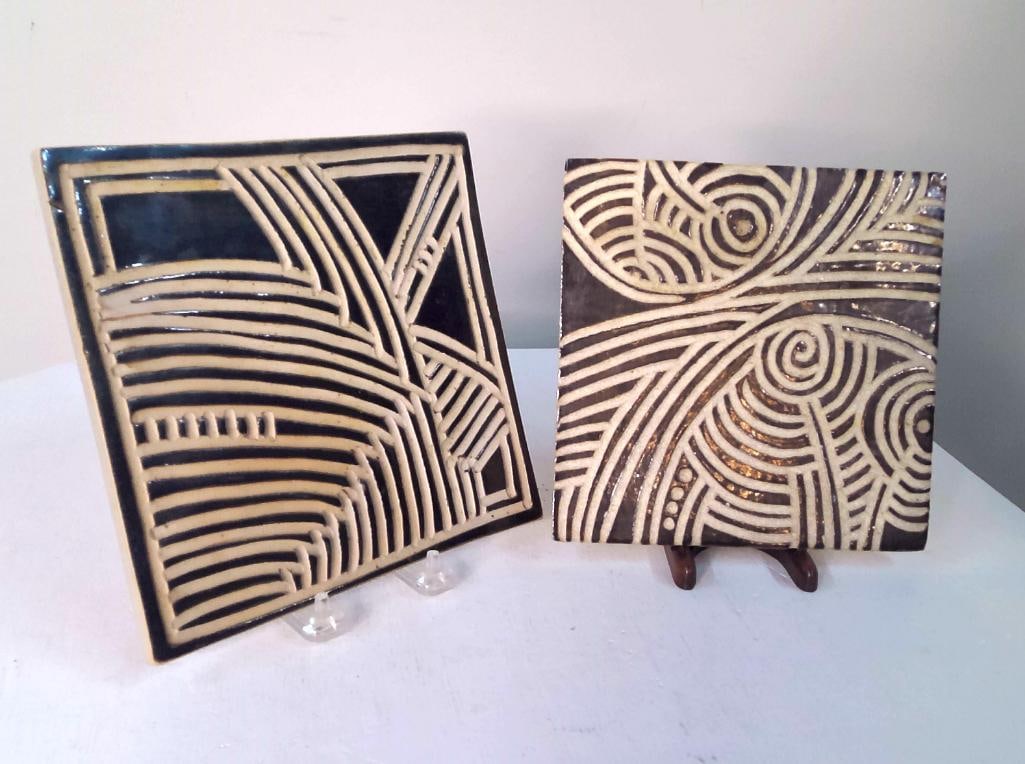 Richard Proctor Art Tiles 2013-14: Richard M. Proctor (American, Palm Springs, California) Pair of hand-built ceramic art tiles featuring abstract curvilinear designs executed in relief against a dark glazed ground. Reverse impressed &