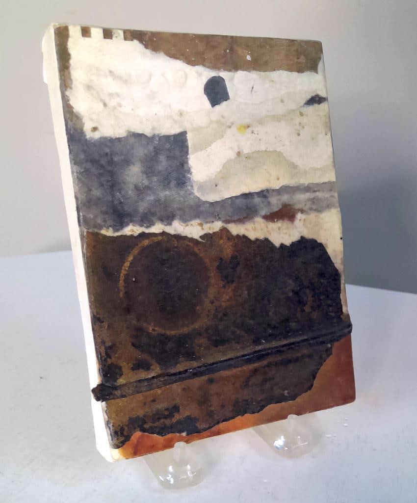 Sylvia Torres (American, California) Haiku #22: 2012. Mixed-media abstract composition featuring layered paper elements, atmospheric gray and cream passages, and weathered rust-toned forms creating a contemplative minimalist surface. Signed and dat