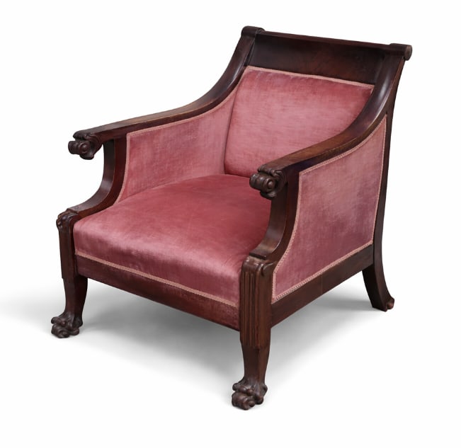 George II Style Mahogany Upholstered Armchair: Armchair in the George II taste, with shaped crest rail and outward scrolled arms terminating in carved dragon-head forms, raised on cabriole legs with carved knees and paw feet. Upholstered seat, bac