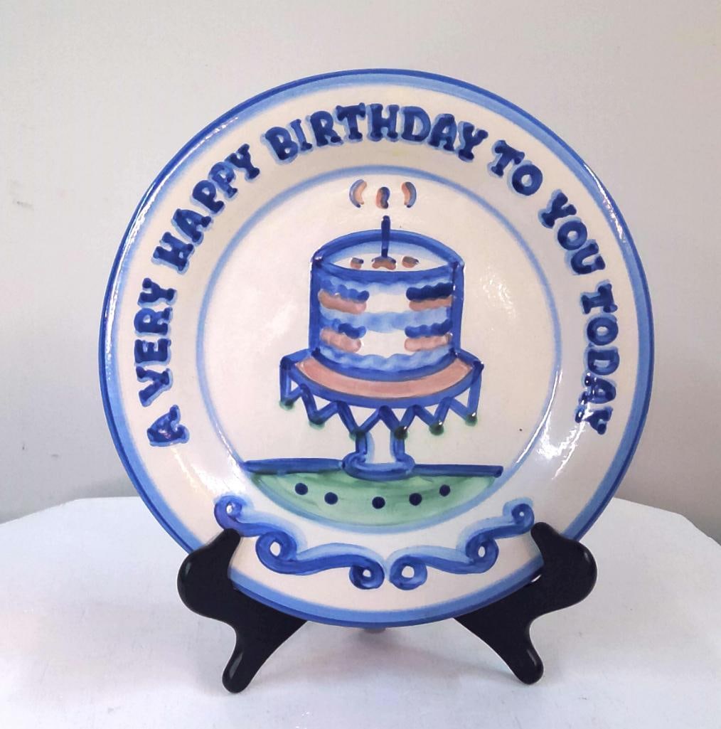 Mary Alice Hadley Pottery Happy Birthday Charger: Hand-painted ceramic charger by Kentucky folk art potter Mary Alice Hadley (American, 1931–2007). Decorated in Hadley's characteristic blue, green, and pink palette, featuring a birthday cake wi