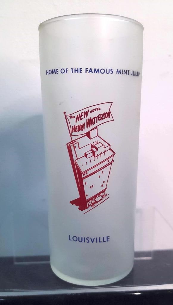 Vintage Hotel Henry Watterson Louisville Mint Julep Glass: Mid-20th-century frosted glass advertising Louisville’s Hotel Henry Watterson as the “Home of the Famous Mint Julep.” Decorated in blue and red with an illustration captioned “The New Hote