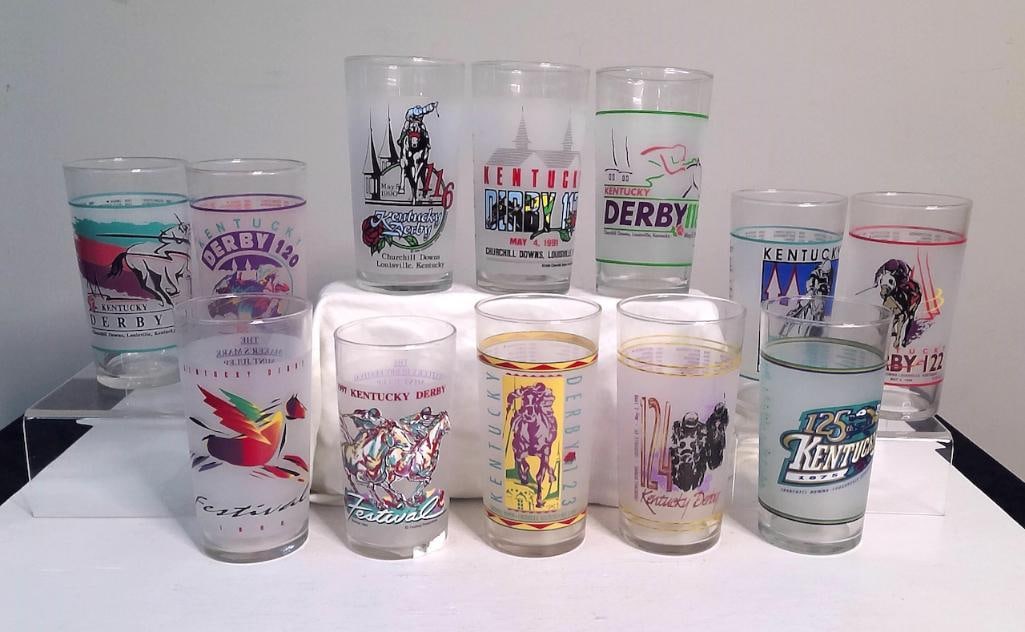 1990–1999 Kentucky Derby Glasses with Festival Glasses: Group of twelve commemorative drinking glasses comprising a complete decade run of official Kentucky Derby Mint Julep glasses from 1990 through 1999, representing Derby Nos. 116–125. Also included a