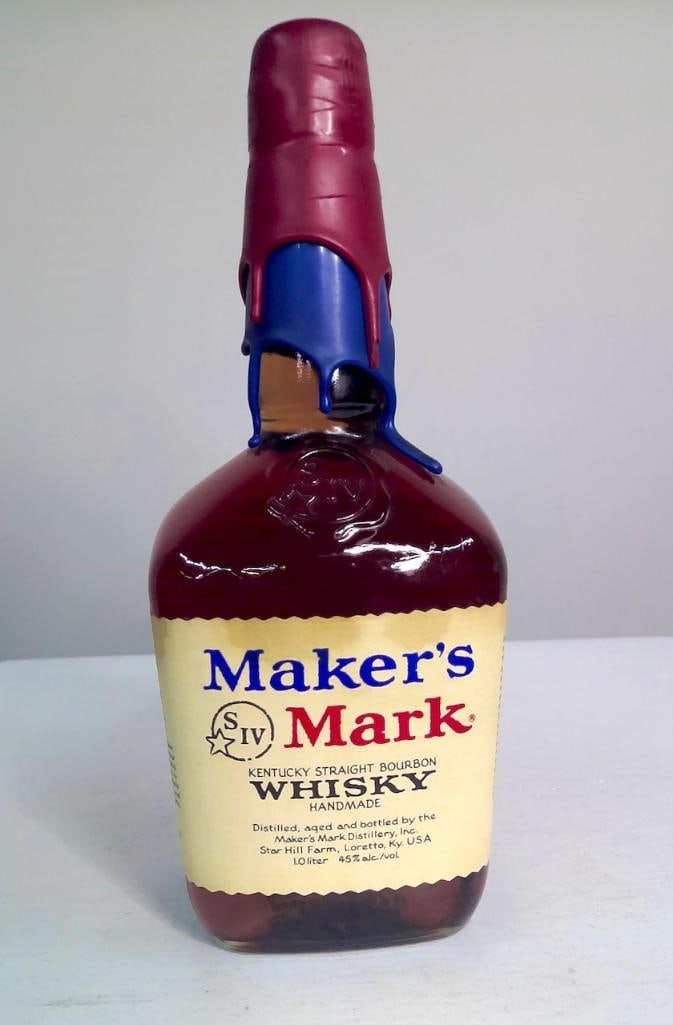 2001 Maker’s Mark Kentucky–Louisville Rivalry Commemorative Bourbon Bottle: 2001 Maker’s Mark Kentucky–Louisville Rivalry Commemorative Bourbon Bottle Maker's Mark Distillery, Star Hill Farm, Loretto, KY, 2001 (game date referenced: December 29 2001) Sealed 1-liter bo