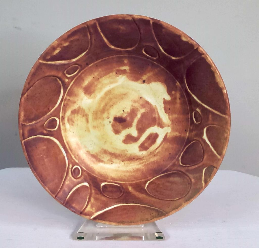 Bellardo Studio Pottery Charger, Dated 2008: Hand-thrown stoneware charger or decorative bowl with impressed pebble-form decoration to the rim and a mottled copper, ochre, and amber glaze. Signed and dated "Bellardo 6-21-08" to the