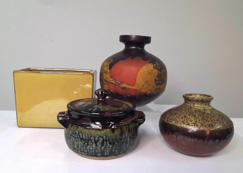 Four Mid-Century and Studio Pottery Articles: Collection of four ceramic decorative articles including a bulbous vase with red, brown, and crackle-decorated glaze, a covered stoneware casserole with mottled green glaze, a rectangular yellow