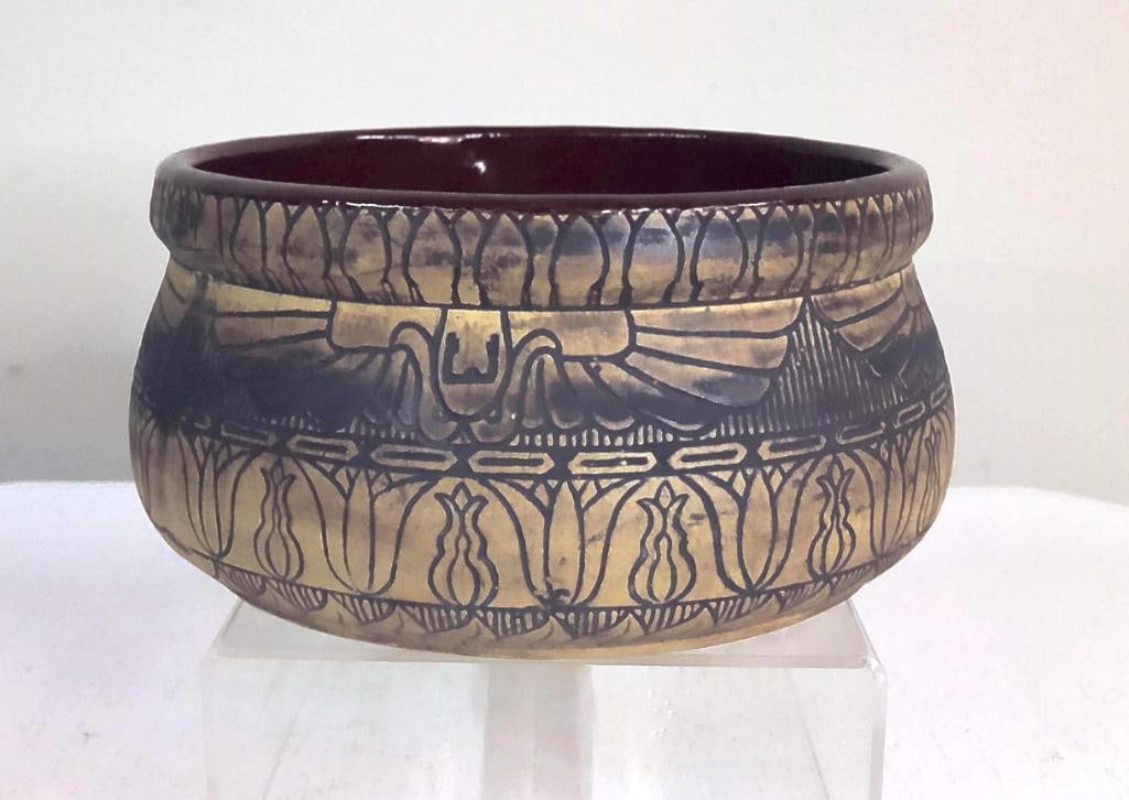 Compton Pottery Decorated Stoneware Bowl: American, mid-20th century. Circular stoneware bowl, shape number 771, decorated with hand-incised Egyptian Revival motifs including stylized winged ornament and repeating lotus-form border. Impressed